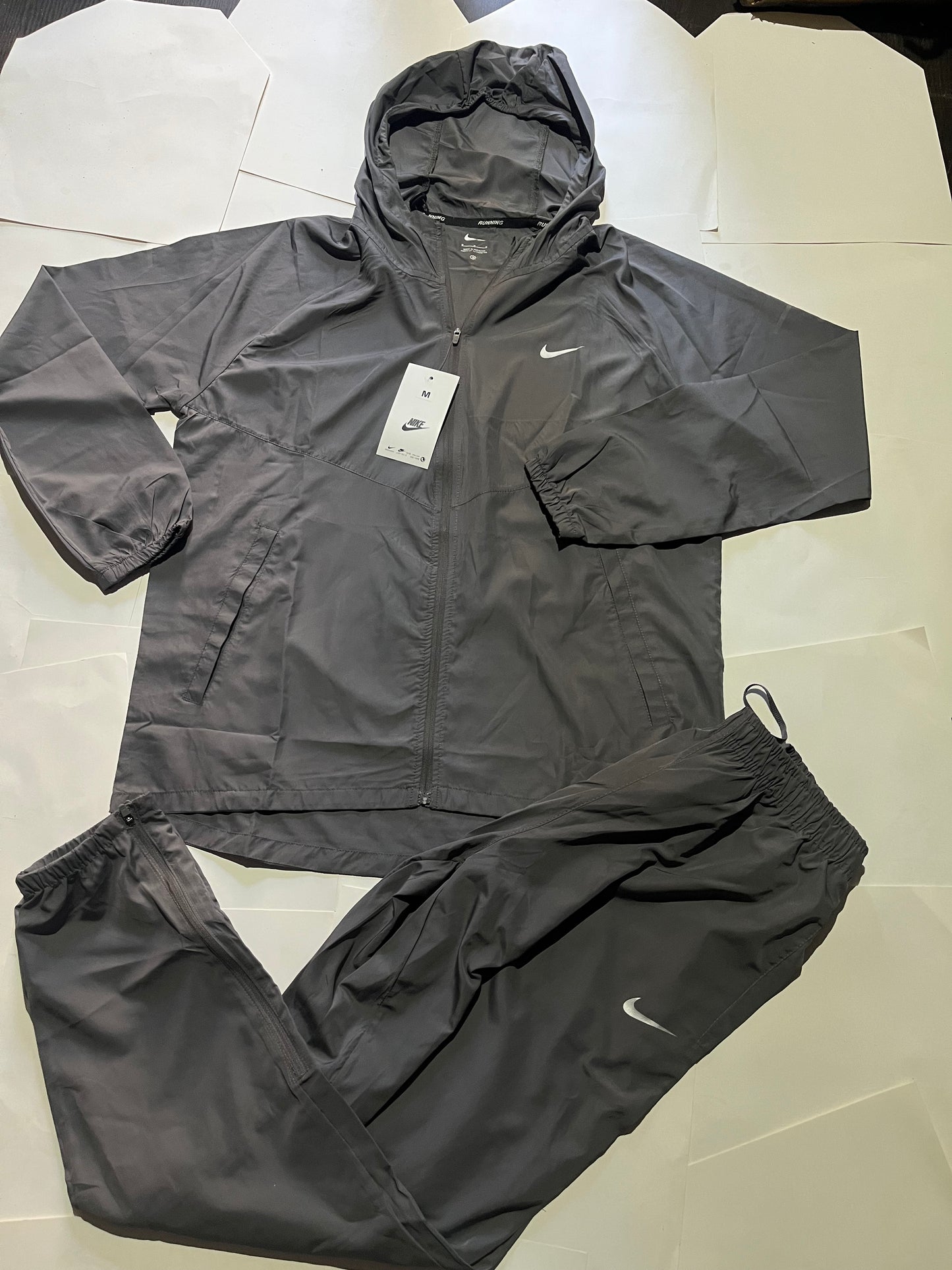 Grey swoosh miller